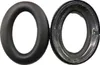 A black ear cushion and a silver inner frame for headphones are shown side-by-side on a white background. Náhled obrázku produktu