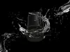 A black SONY ULT Field 1 Bluetooth speaker is shown surrounded by splashing water against a black background. Voir les images du produit