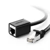 A close-up shot of a black Ethernet cable extension adapter with an RJ45 connector. Produktbild-Vorschau