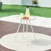 An outdoor table with drinks and strawberries on a patio. Náhled obrázku produktu