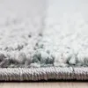 A close-up view of the edge and texture of a rug. Podgląd zdjęcia produktu