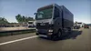 A truck driving on a highway with other vehicles. Anteprima dell’immagine prodotto