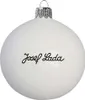 A white Christmas ornament with the signature "Josef Lada" written on it. Náhled obrázku produktu
