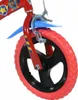 Close-up of the front wheel and fork of a red children's bicycle. Produktbild-Vorschau