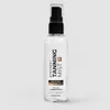 A clear studio shot of a bottle of Byrokko Tanning Mist. Produktbild-Vorschau