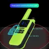 A neon green walkie-talkie is shown against a black background with a digital lock graphic and text overlays. Voir les images du produit