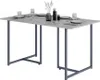 A dining table set with plates, glasses, and decorative items. Anteprima dell’immagine prodotto