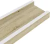 A close-up view of a wooden shelf with white edges. Náhled obrázku produktu
