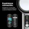 A close-up marketing image showing a hair dryer with a digital interface displaying different styling modes and a personalized greeting on a screen. Produktbild-Vorschau