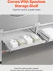 A close-up view of a storage shelf under a washing machine, holding laundry supplies. Voir les images du produit