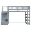 A gray loft bed with stairs and shelves against a white background. Produktbild-Vorschau