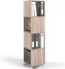 A tall, narrow bookshelf with four cubic shelves, filled with books and binders. The bookshelf is made of light brown wood-grain material and rests on a circular base that allows it to spin. Náhled obrázku produktu