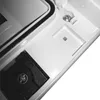 A close-up view of the interior of a white electrical enclosure, showing a black rubber seal, a screw, and a small square opening. Produktbild-Vorschau