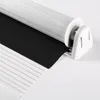 A close-up view of a roller blind mechanism and fabric. Produktbild-Vorschau