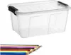 A clear plastic storage box with black clasps is shown from a slightly elevated angle. Below the box, a row of colored pencils is arranged. Produktbild-Vorschau