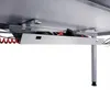 Underside of a desk with a cable management tray and power strip. Anteprima dell’immagine prodotto