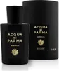 A black bottle of Acqua di Parma Quercia perfume and its cylindrical packaging are shown against a white background. Voir les images du produit