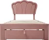 A pink velvet bed frame with a scalloped headboard and built-in drawers is shown against a white background. Produktbild-Vorschau
