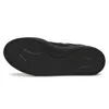 The underside of a black Adidas sneaker. Produktbild-Vorschau
