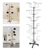 A black metal hat stand with multiple tiers and holders for hats. Produktbild-Vorschau