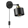 A black and copper wall lamp with an exposed light bulb is shown against a white background. Náhľad obrázku produktu