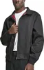 A man wearing a black jacket. Anteprima dell’immagine prodotto