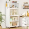 A white kitchen cabinet with multiple shelves and transparent doors, standing on wheels, in a kitchen setting. Náhľad obrázku produktu