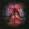 A person with pink hair in a futuristic outfit, seemingly trapped in a circular cage with pink lighting. Produktbild-Vorschau