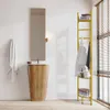 A modern bathroom with a wooden vanity, a tall mirror, and a gold ladder shelf holding towels and toiletries. Podgląd zdjęcia produktu