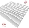 A white 3D wall panel with a wave pattern is shown against a white background. Náhľad obrázku produktu