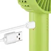 A close-up view of a green portable fan being charged by a white USB cable. Anteprima dell’immagine prodotto