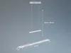 A modern pendant light with two illuminated bars hanging from a ceiling mount. Produktbild-Vorschau