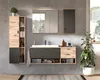 A modern bathroom vanity set with a sink, cabinets, and a mirror, displayed against a tiled wall. Produktbild-Vorschau
