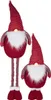 Père Noël sur pattes télescopiques 100 cm - Figurine Voir les images du produit 1