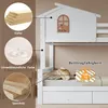 Close-up of a white bunk bed with a house-shaped top, featuring informational callouts about materials and weight capacity. Anteprima dell’immagine prodotto