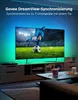 A television displaying a soccer game with Govee LED lights synchronized to the screen, set in a living room. Produktbild-Vorschau