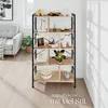 A modern living room with a gray sofa and a wooden shelf unit filled with decorative items. Náhled obrázku produktu