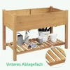 A wooden raised garden bed with a lower shelf, displaying gardening tools and containers. Produktbild-Vorschau