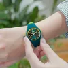 A person's wrist wearing a watch. Produktbild-Vorschau