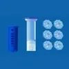 A product shot of toilet cleaning discs and a dispenser against a blue background. Náhľad obrázku produktu