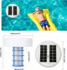 A boy is relaxing on a yellow inflatable raft in a swimming pool, with a solar pool ionizer floating nearby. Produktbild-Vorschau