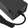 A close-up view of a black power adapter with a black cable connected to it. Produktbild-Vorschau