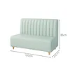 A light green sofa with a fluted backrest is shown against a white background. Dimensions are indicated with lines and text. Voir les images du produit