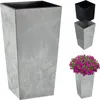 A large grey planter with a black insert, and a smaller grey planter with pink flowers. Produktbild-Vorschau
