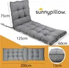 A grey outdoor lounge chair cushion is shown with dimensions indicated. Produktbild-Vorschau