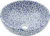 A round ceramic sink with a blue floral pattern. Náhled obrázku produktu