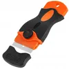 A scraper tool with an orange and black handle and a silver blade. Náhled obrázku produktu