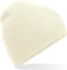 A close-up studio shot of a cream-colored beanie.