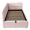 A pink upholstered bed frame with a slatted mattress support is shown from a diagonal, slightly elevated angle against a white background. Anteprima dell’immagine prodotto