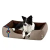 A dog is lying in a dog bed. Náhľad obrázku produktu